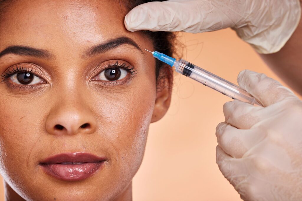 A woman getting a BOTOX injection